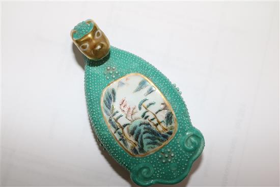 A 19th Century Chinese enamelled porcelain belt hook, pseudo Qianlong mark